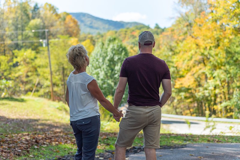couple enjoying the fall color in the nc blue ridge mountains